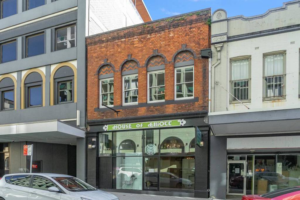 Innercity Newcastle building with shopfront and New Yorkstyle